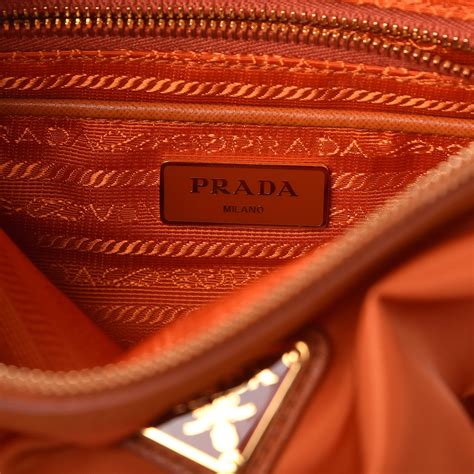 prada pattina tessuto saffian|Prada tessuto saffiano papaya.